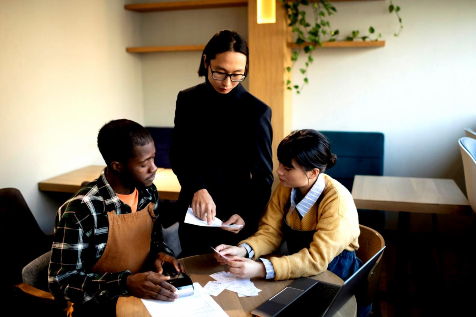 Financial analysts collaborating in modern workspace